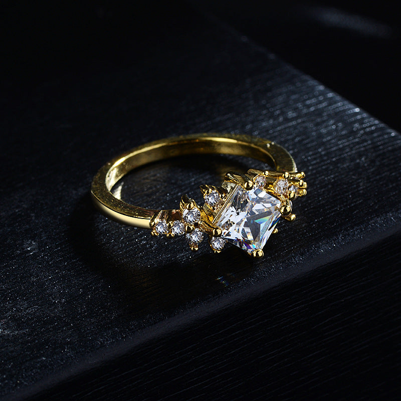 14k gold Princess cut tail ring